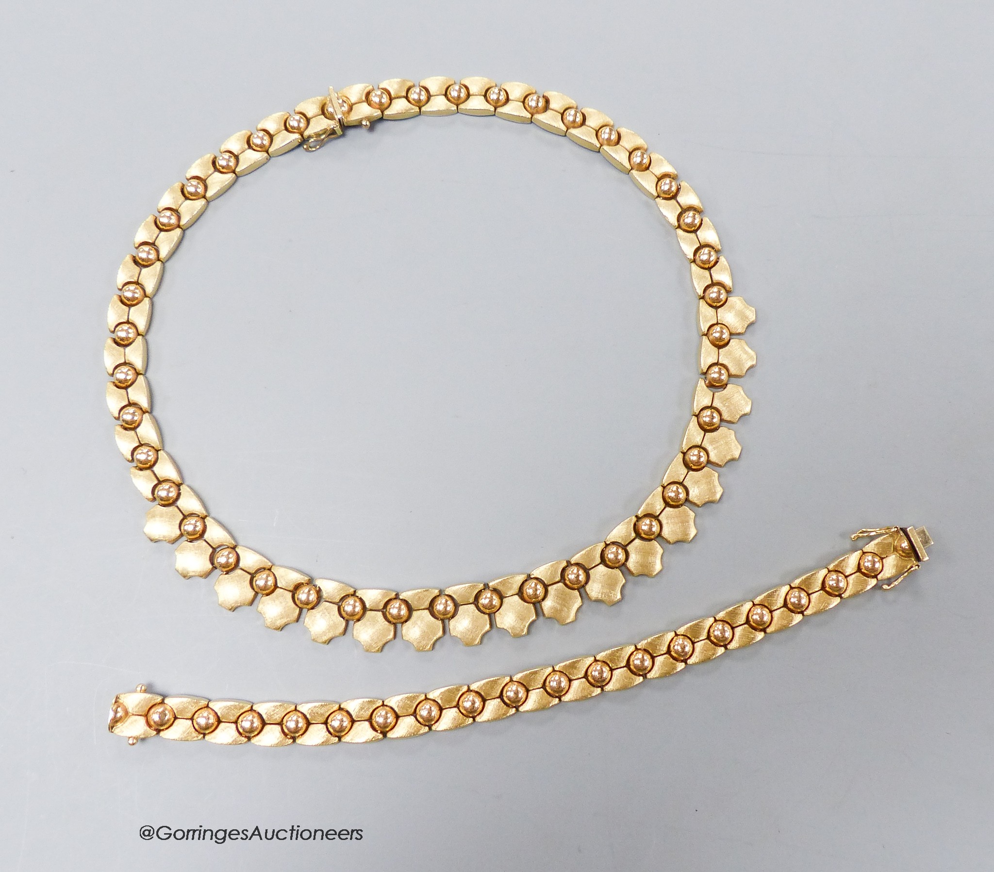 A modern 9ct gold necklace, 44cm and matching bracelet, 18cm